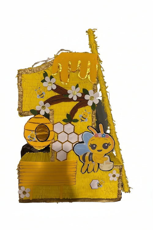 Piñata artesanal número 1 temática abejita en color amarillo con flores blancas, panal de miel, colmena y abeja tierna decorativa. Ideal para primer cumpleaños, hecha a mano con detalles brillantes en tonos amarillo y dorado.”

También te recomiendo cambiar el nombre del producto a algo más atractivo:

🐝 Piñata Número 1 Abejita Dulce para Primer Cumpleaños

o

🍯 Piñata Número 1 Abejita y Panal de Miel

Se verá más profesional en tu tienda Shopify y ayudará a que los clientes la encuentren más fácilmente. 